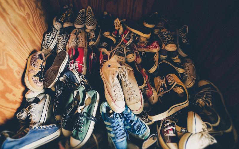 a heap of old used shoes