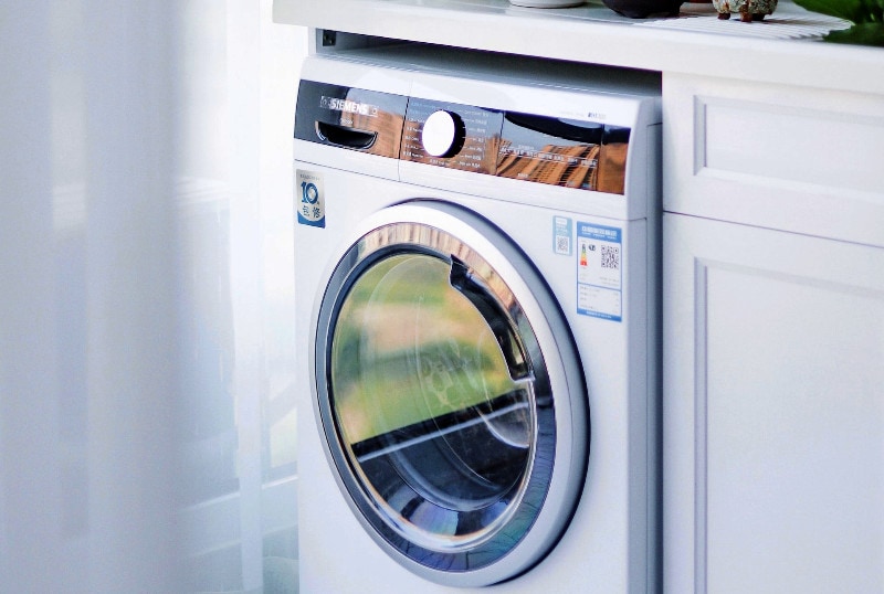 a white cloth dryer machine