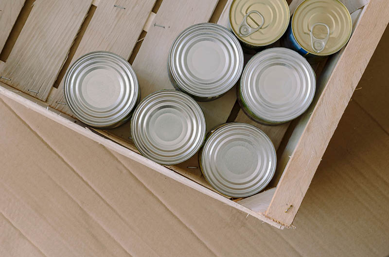 canned goods stored in a crate box