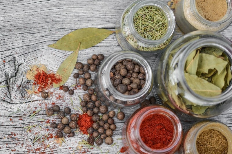 herbs and spices in jars