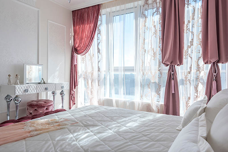 interior of a bedroom with curtains