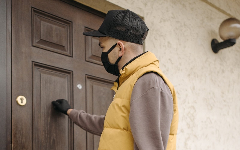 man knocking on door