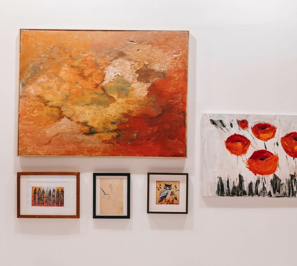 multiple pictures hanging