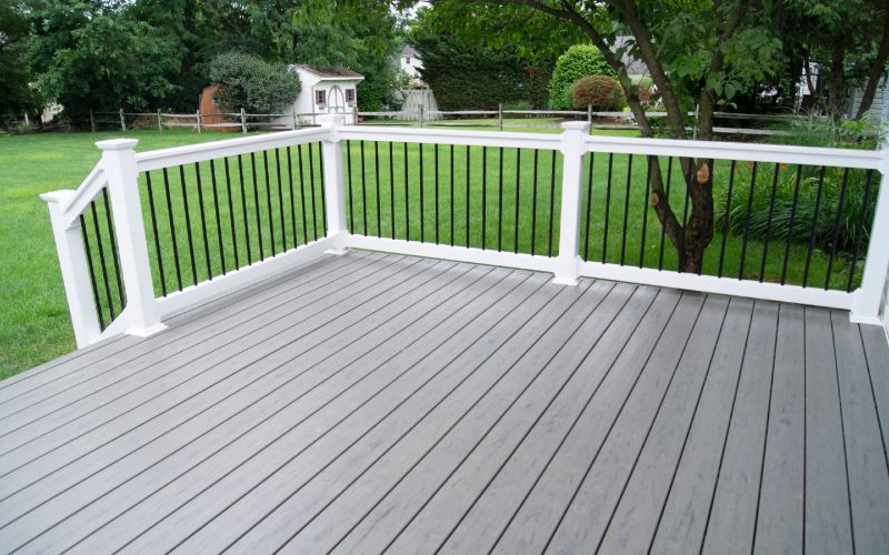 residential backyard with gray deck patio