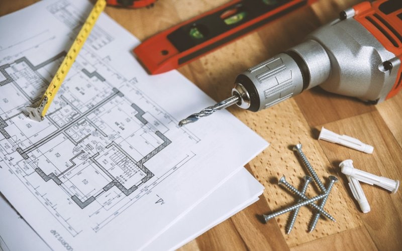 tools and floor plan on table