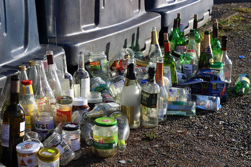 used bottles in trash