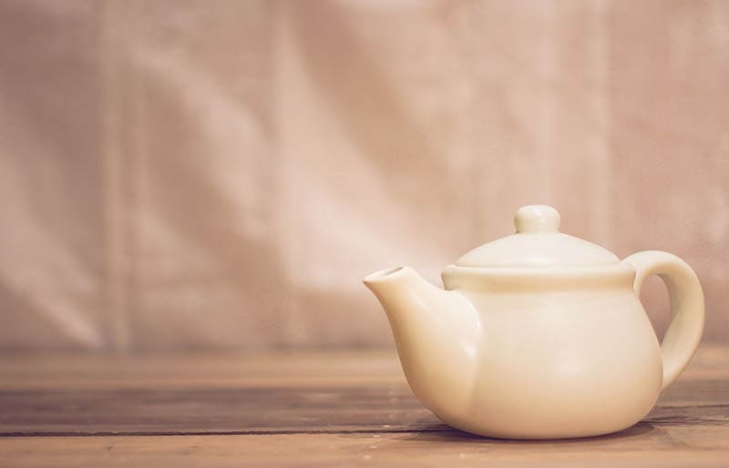 white ceramic teapot