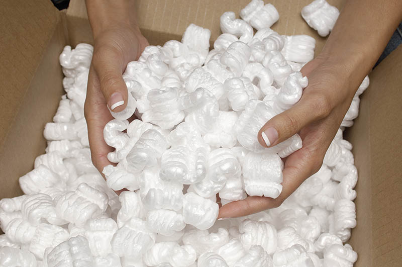 woman holding packing peanuts