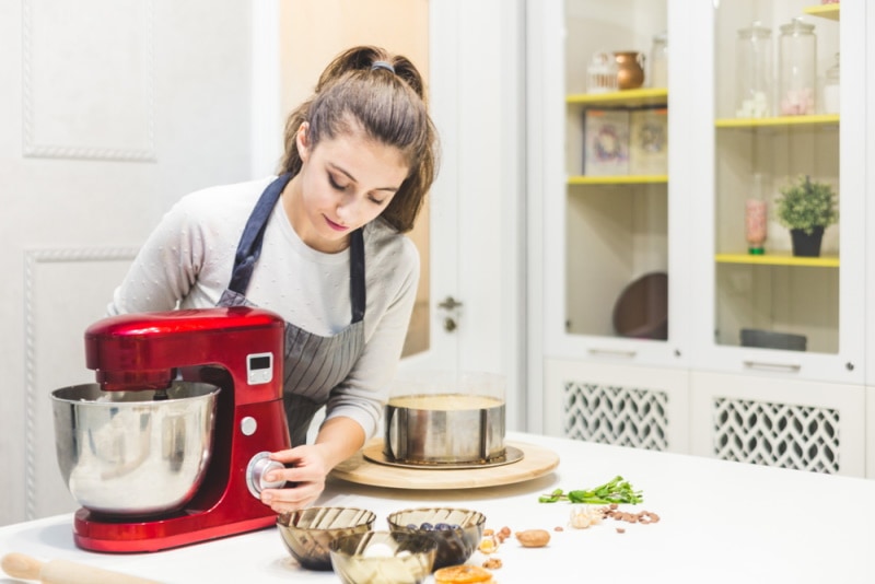 woman using bread mixer