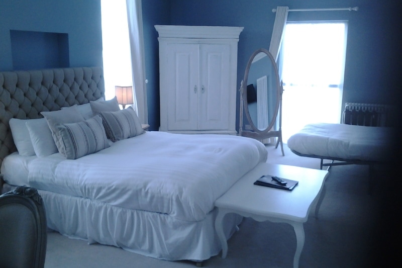 Bedroom with blue walls