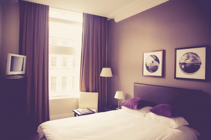 Bedroom with purple color scheme