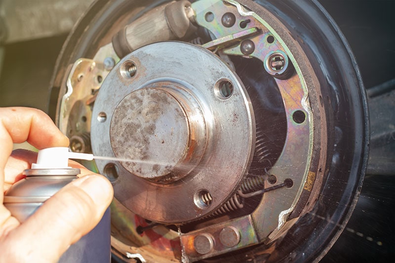 car drum brake cleaning with spray
