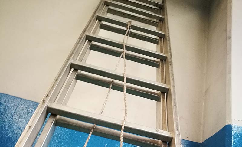 Extension Ladder lay on the wall