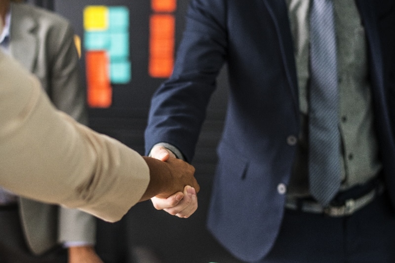 Handshake after an agreement
