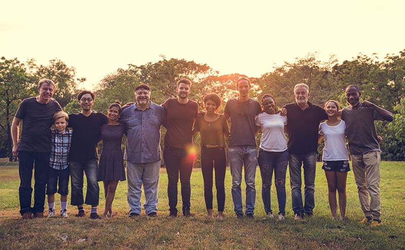 Happiness group of people huddle and smiling together