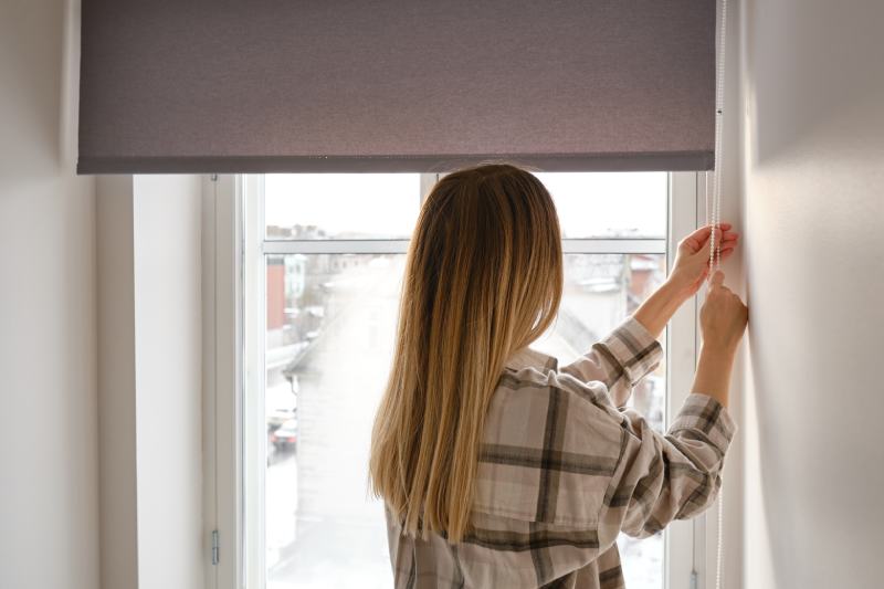 Home blinds or window curtains girl opens the window
