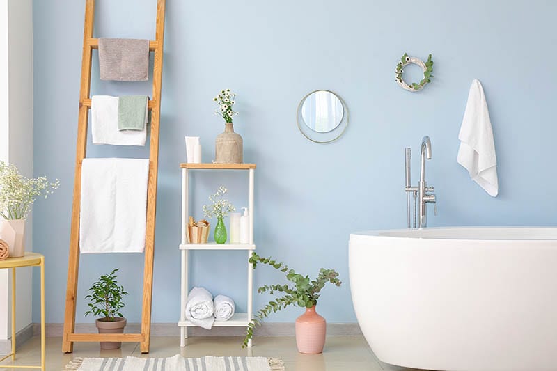 Interior of bathroom with floral decor