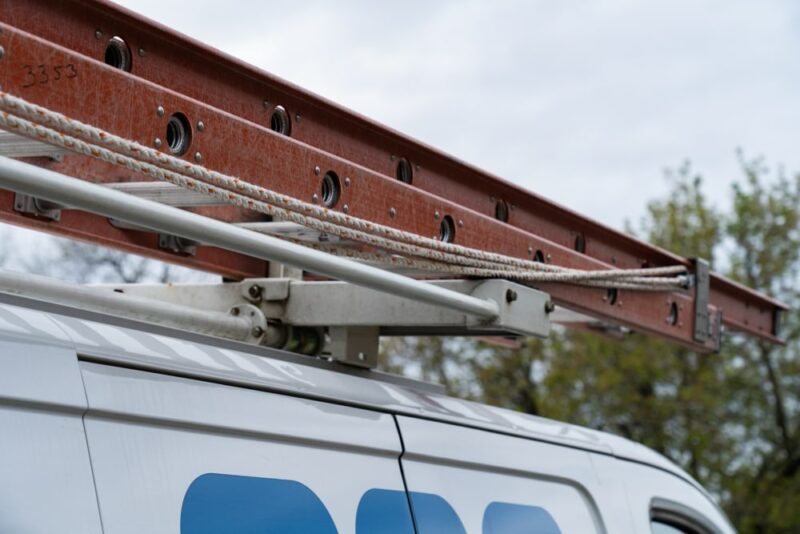 Ladder mounted on the roof of a work van