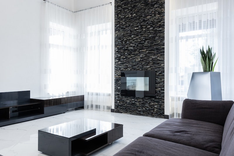 Living room with electric fireplace in the wall