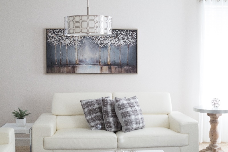 Living room with white walls and white furniture