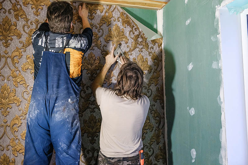 Men installing Wallpaper