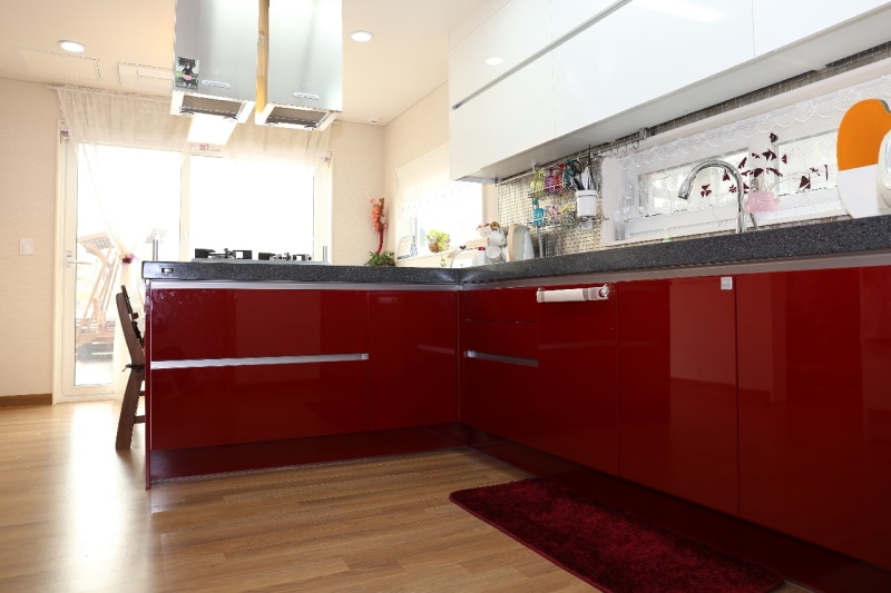 Modern kitchen with red cabinets