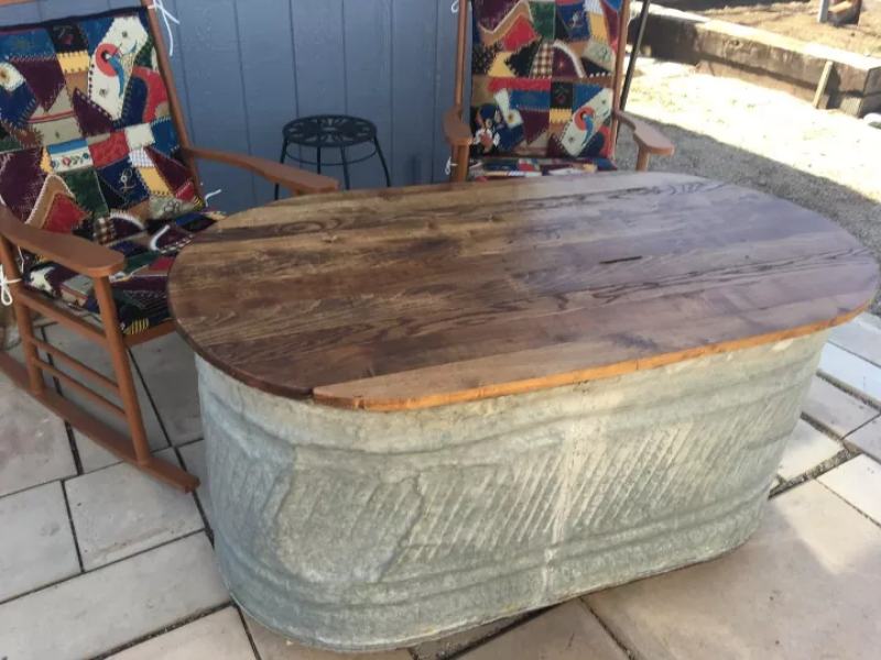 Old Water Trough to a Patio Storage and Table