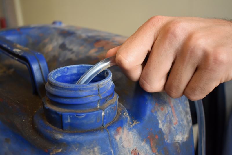 Old jerrycan with gasoline