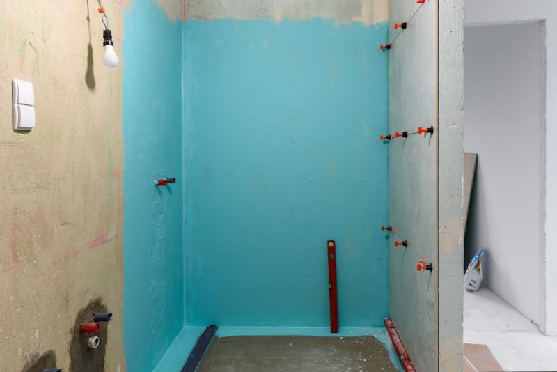 Wall waterproofing in a shower cabin or bathroom in renovation