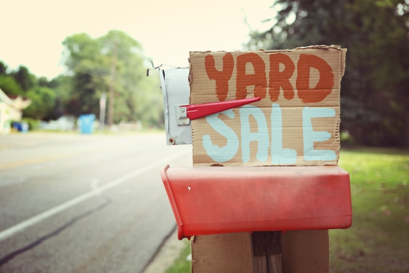 Yard sale sign stuck to a mail box