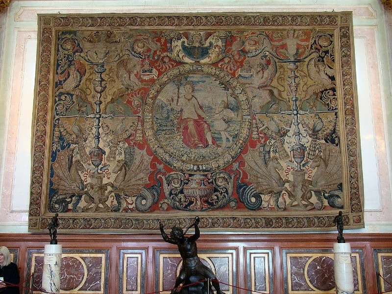 a large hanging tapestry on wall