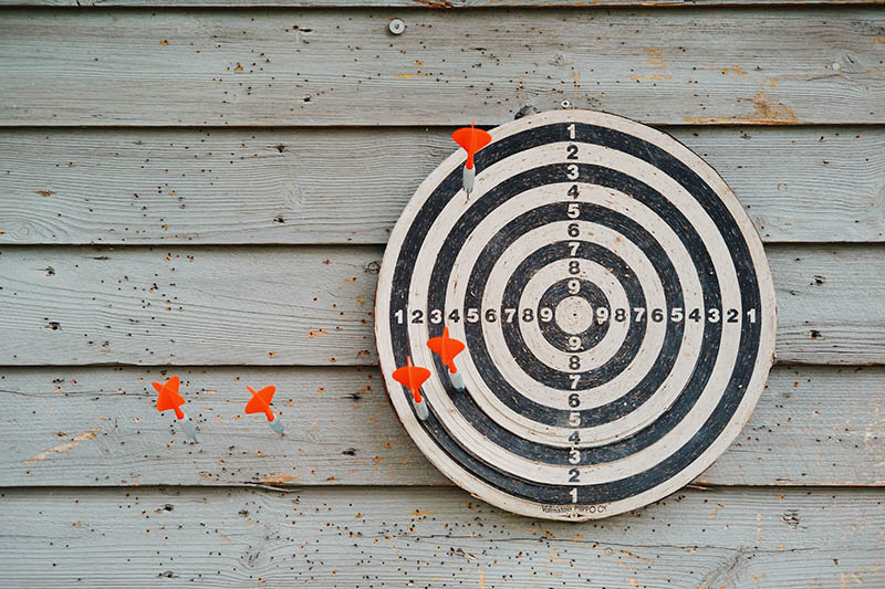 a wooden dartboard