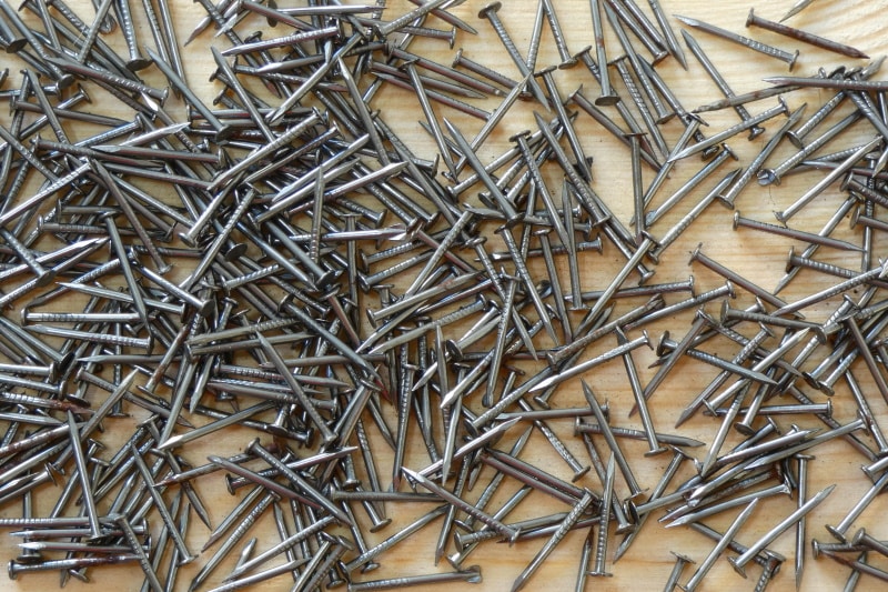 assorted nails in the table