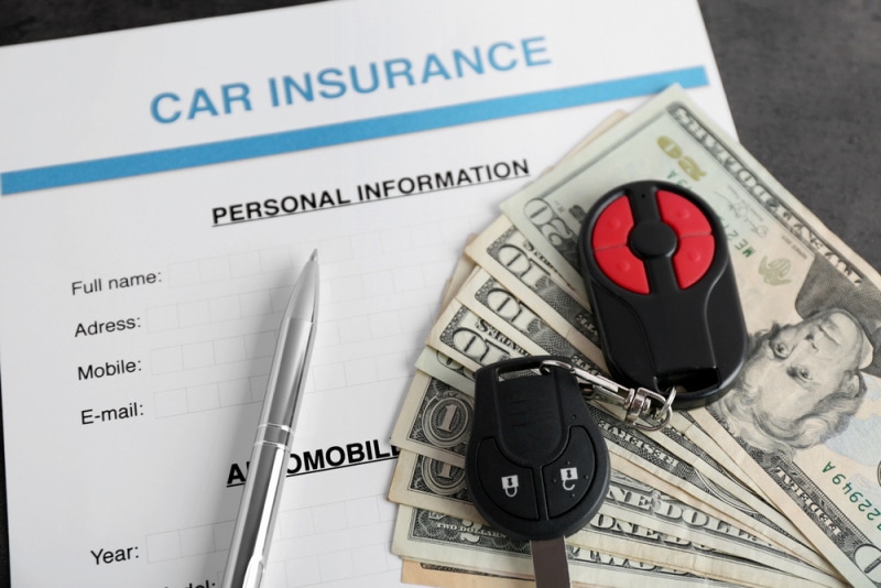 car insurance with money and car key