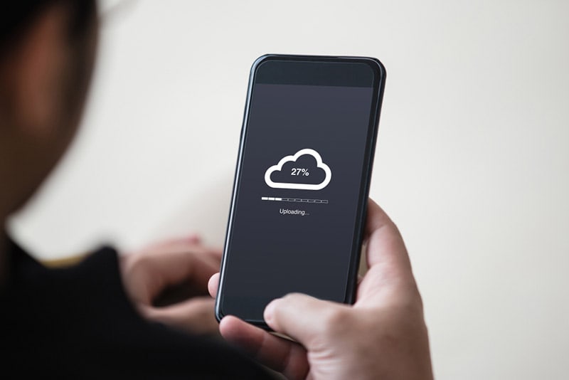 cloud uploading concept on phone screen