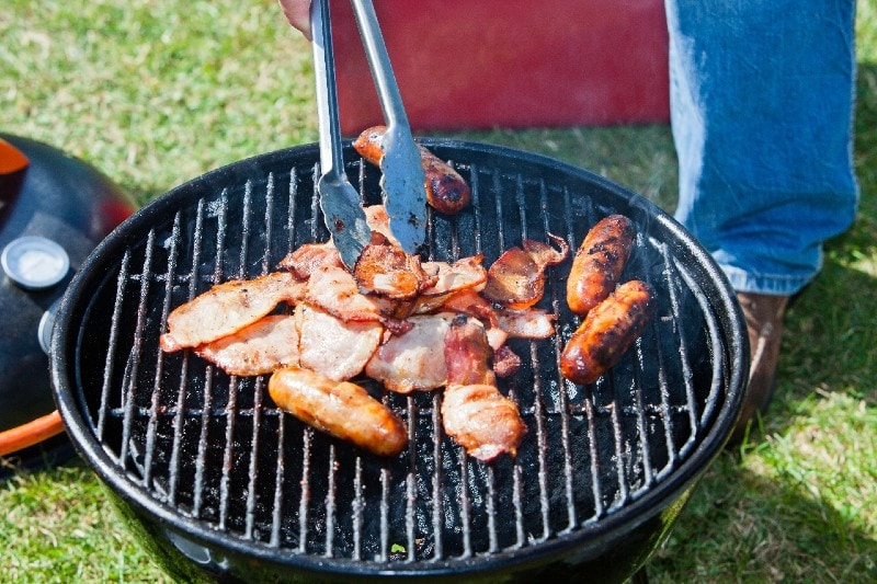 grilling meat outdoors