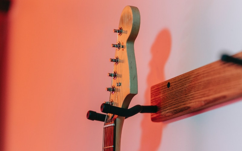 guitar mounted on the wall