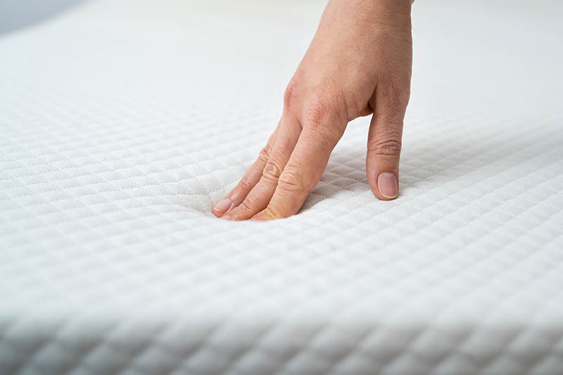 Hand Testing Orthopedic Memory Foam mattress