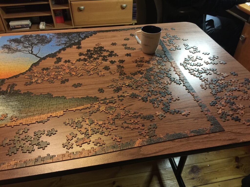 Puzzle on flat surface