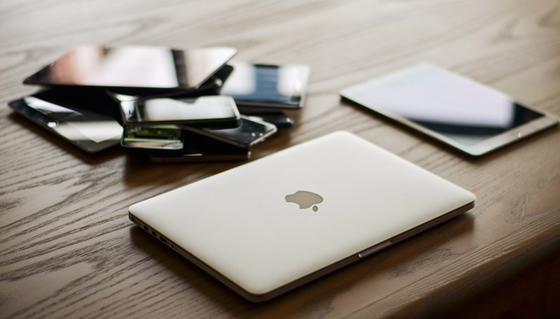 macbook, ipad, and smartphones on the table