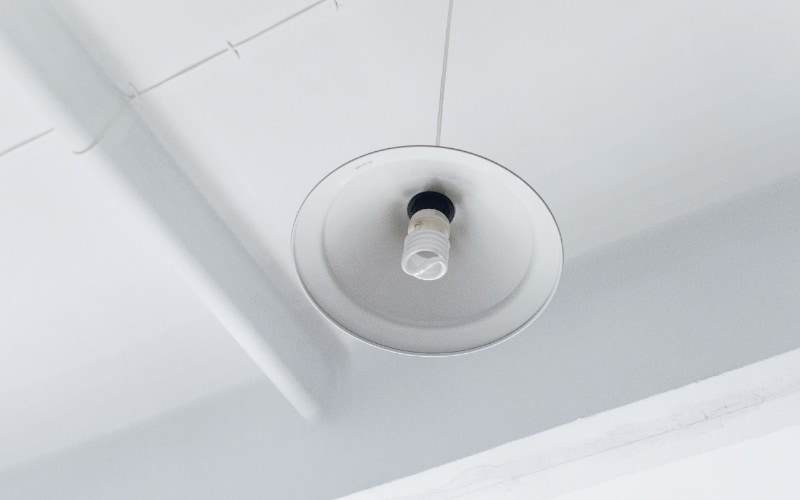 pendant light hanging from a white ceiling