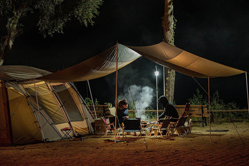 people camping at night