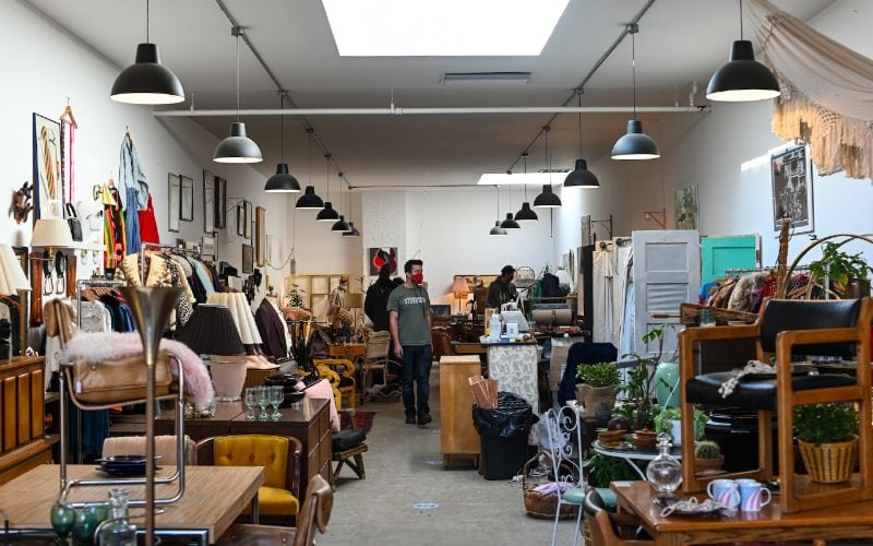 people in a thrift store