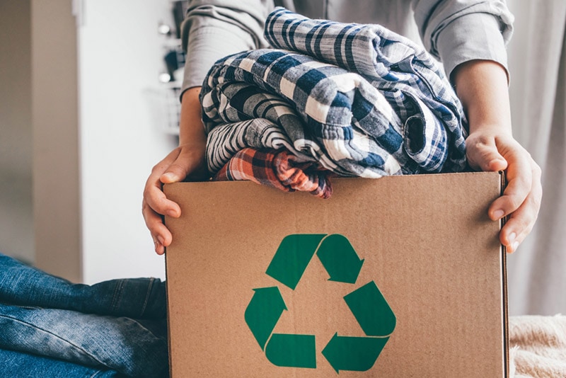 recycling box full of clothes