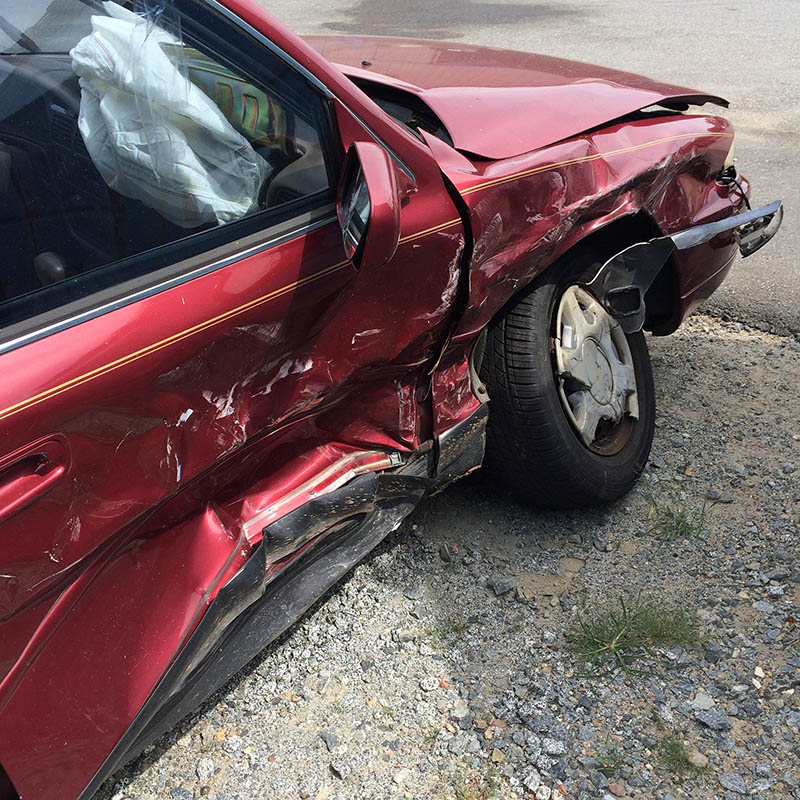 red car in an accident