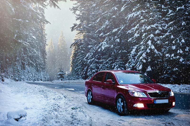 red car in snow