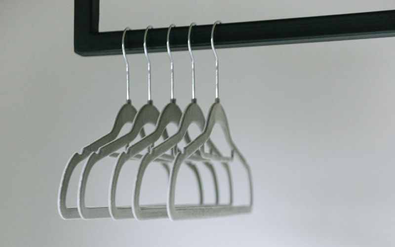 white and silver velvet clothes hangers