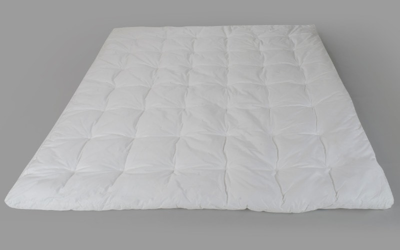 white fiber mattress bed topper