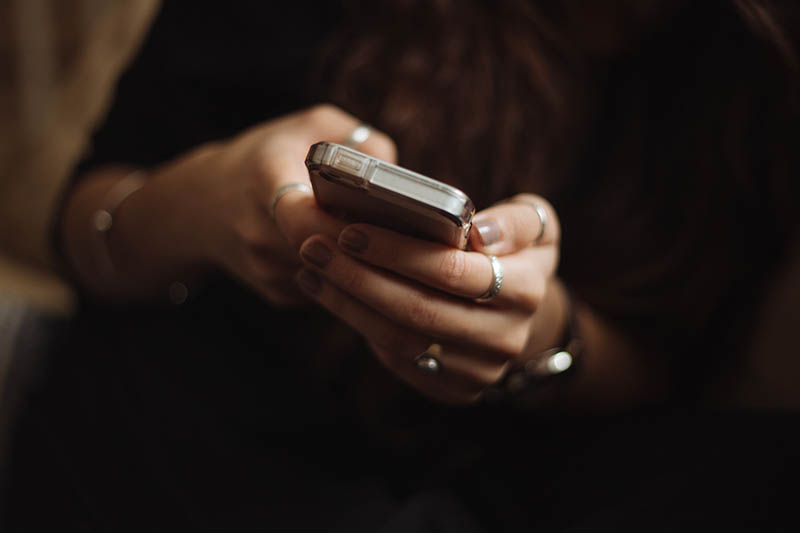 woman holding a smartphone