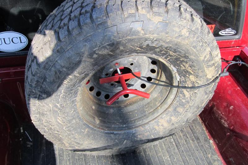 DIY Mount for spare tire in the truck bed